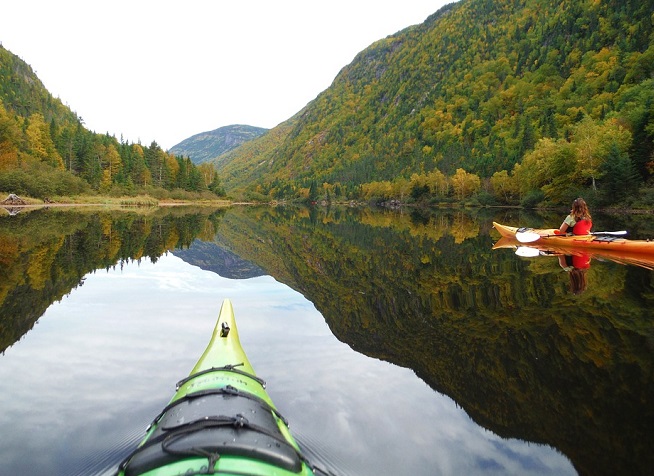 kayaking on a picturesque mountain lake